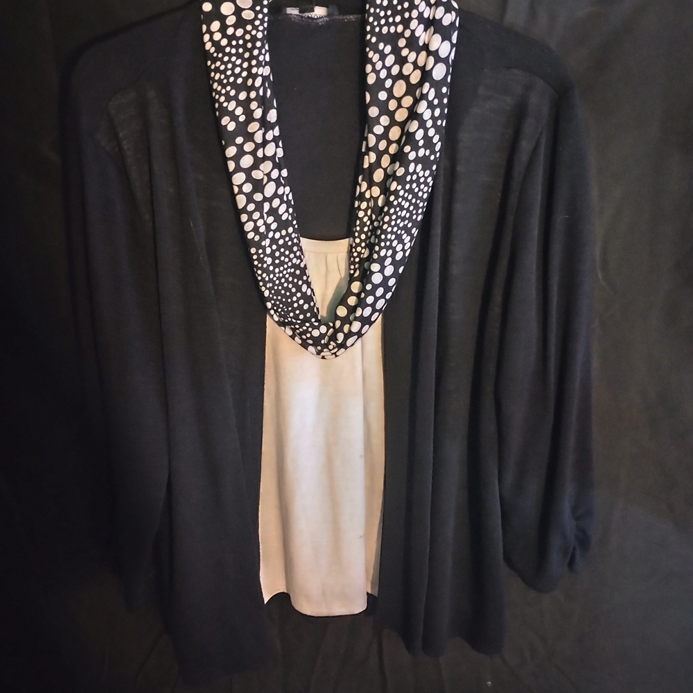 Elegant Black and Cream Blouse with Polka Dot Detail